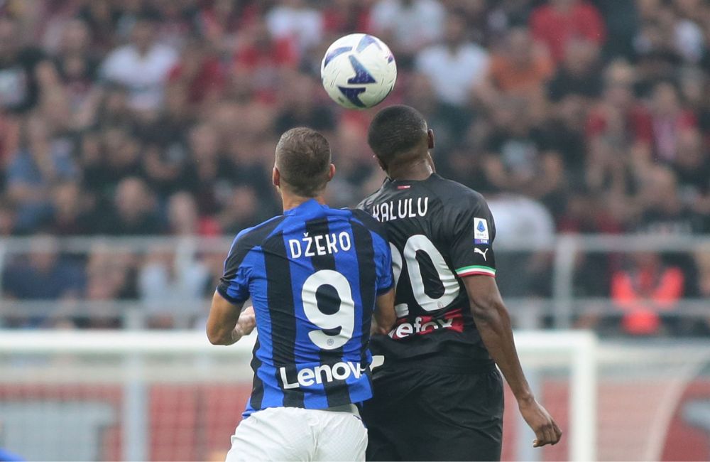 Milan-Inter: Edin Dzeko, Pierre Kalulu (Photo Credit: Agenzia Fotogramma)