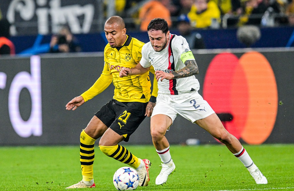 Borussia Dortmund-Milan: Davide Calabria e Donyell Malen (Photo Credit: Agenzia Fotogramma)